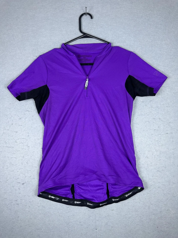 Camiseta deportiva de ciclismo Canari para mujer mediana púrpura negra manga corta bicicleta bolsillos superiores Foto 1 de 4