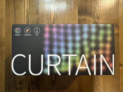 Curtain Lights 400 LED 2*2 With Remote And Music App Controls & Custom Colors - Image 1 of 4