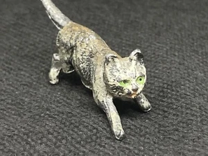 Katze mit grünen Augen von Unbekannt (N yel 178) kaltbemalt, beschädigtes Bein - Bild 1 von 9