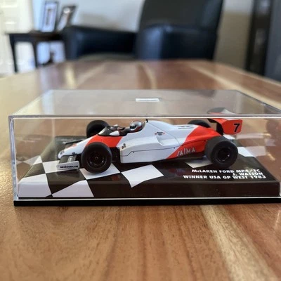 MiniChamps:  McLaren Ford MP4/1C #7  J. Watson  Winner USA GP West 1983    1:43 - Image 1 of 4