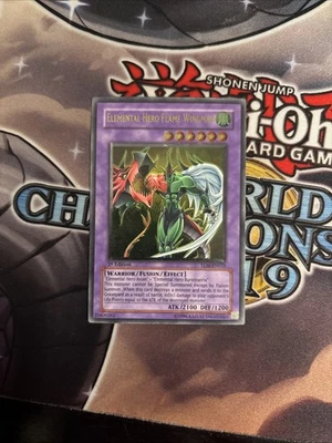 (MC) Yugioh Elemental Hero Flame Wingman TLM-EN035 Ultimate 1st Silver Stamp LP - Image 1 of 4