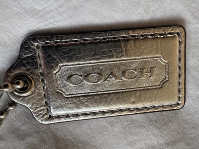 2.5" Large COACH Silver Metallic Leather Nickel Fob Bag Charm Keychain Hang Tag - Image 1 of 4