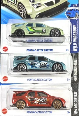 Pontiac Aztek Custom Sage 2025 Hot Wheels, rojo, azul primera edición.  Lote de 3 Foto 1 de 4