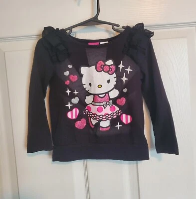 Top de manga larga Hello Kitty By Sanrio niñas pequeñas 3T negro con volantes hombros Foto 1 de 4