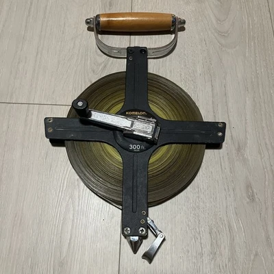 Komelon N6300 300-Feet Open Reel Metal Frame Long Steel Tape Measure - Image 1 of 4
