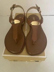 NIB MICHAEL KORS MK PLATE FLAT THONG SANDALS  Luggage size 6.5 New In Box - Picture 1 of 7