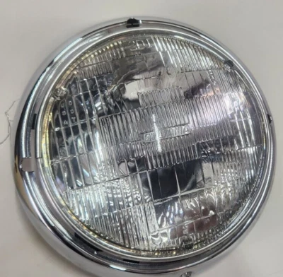 Conjunto de faros redondos 1992-2007 OEM Ford F2UZ13008F Sylvania GE Foto 1 de 4