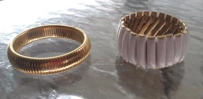 LOT OF TWO VINTAGE METAL/PLASTIC BRACELETS 1 GOLD COLOR&1 WHITE AND GOLD COLORED - Image 1 of 3