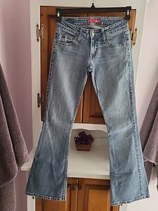 Levi's Women's too super low 524 Jeans Light Blue Distressed Holes 1 Medium - Picture 1 of 4