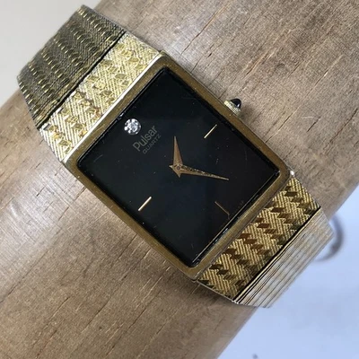 Reloj de cuarzo vintage Pulsar para hombre V320-5069 con detalles de diamantes tono dorado 24 mm 8" Foto 1 de 4