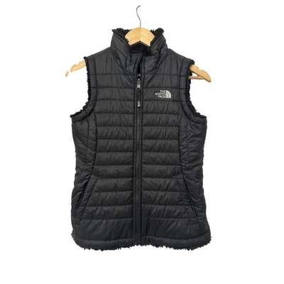 Chaleco acolchado North Face negro niñas talla 10/12 ribete de piel sintética reversible Foto 1 de 4