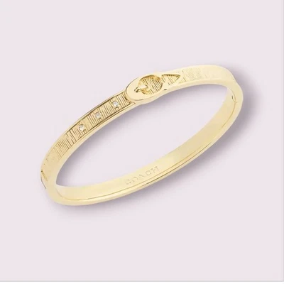 Brazalete Brazalete Coach Oro Cepillado Hebilla Bisagras $125 Nuevo con Etiquetas CCU77 Foto 1 de 4