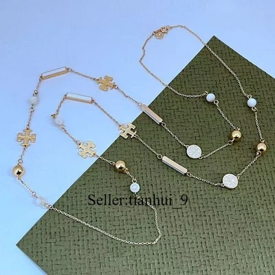 ¡Nuevo! Elegante collar largo para mujer Tory dorado y blanco con bolsa tamaño: 97 cm Foto 1 de 2
