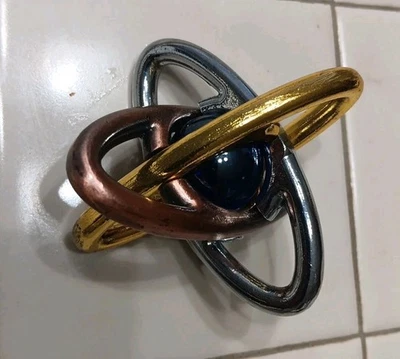 Rompecabezas EZ Atom Rompecabezas Metal Azul Vidrio Mármol Desbloqueo 3D Nudo Entrelazado Foto 1 de 3