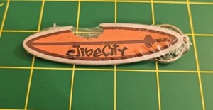 2007 Jibe City Shark bite Surfboard Metal Keychain - Picture 1 of 2