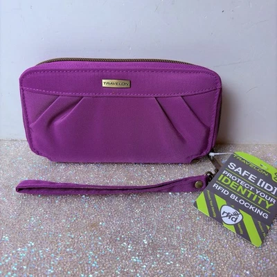 NUEVO Bolso sin asas de viaje Travelon Billetera RFID Bloque Cremallera Alrededor Billetera Muñequera Púrpura Foto 1 de 4