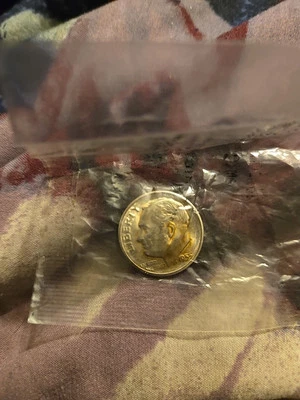 Moneda de diez centavos de error Foto 1 de 4