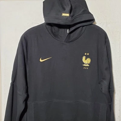 Sudadera con capucha de la selección nacional de Francia para hombre mediana negra dorada fútbol FFF Pullover Nike Foto 1 de 4