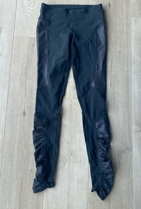 ALO YOGA Idol Leggings mit Rüschen schwarz schimmernd Größe Small - Bild 1 von 5