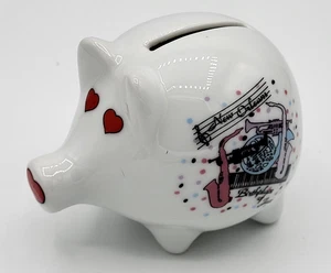 Small ceramic pig bank, New Orleans souvenir art on one side. Rubber stopper. - Picture 1 of 3