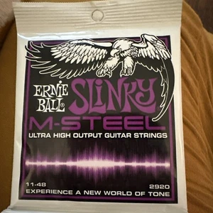 Ernie Ball Slinky M-Steel Ultra High Output Gitarrensaite 11-48 2920 ungeöffnet - Bild 1 von 2