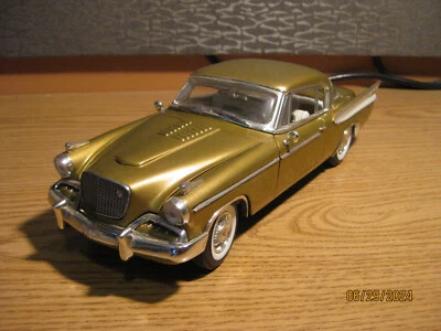 1/18 1957 STUDEBAKER GOLD(EN) HAWK, EN ORO, POR ANSON, SIN CAJA Foto 1 de 4