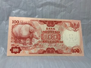 Indonesia 100 rupias 1977 rinoceronte indonesio UNC vida silvestre animal billete de banco - Imagen 1 de 7