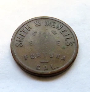 TIENDA DE CIGARROS SMITH & McNEILS - FORTUNA CAL. BUENO PARA 10 CENTAVOS EN TOKEN DE COMERCIO - Imagen 1 de 2