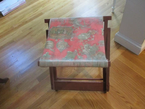 Antique wood folding camp stool. Sturdy/red wood Cover