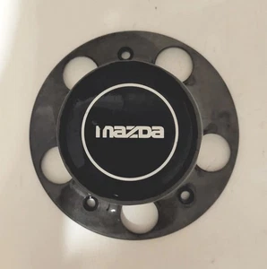 Mazda B-2300 B-2500 B-3000 B-4000 Navajo 1994-2010 Black Wheel Center Cap - Picture 1 of 2