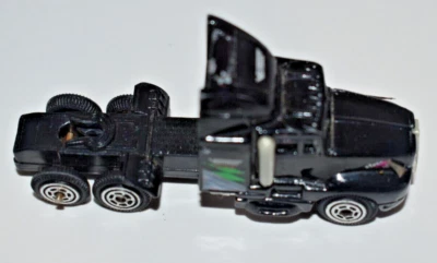 Camión diecast Racing Champions 1992 negro cabina hecho en China Foto 1 de 4