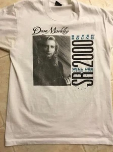 TWO OFFICIAL DEAN MARKLEY SR-2000 WILL LEE SIGNATURE STRINGS T-SHIRTS EXCELLENT - Picture 1 of 3