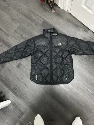 Chaqueta de plumón The North Face negra con aislamiento de burbujas para niño/niña talla L 14-16 Foto 1 de 4