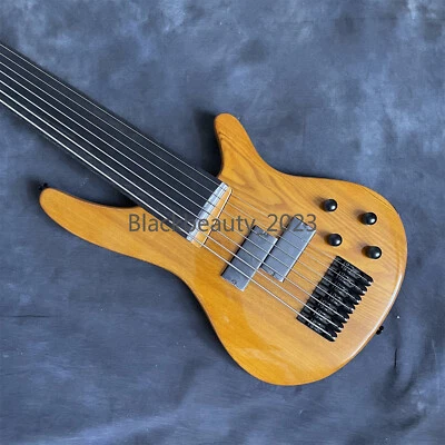 Bajo eléctrico de 7 cuerdas sin marca cuerpo de fresno sólido mástil de arce parte cromada Foto 1 de 4
