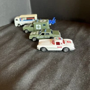 Vtg. Majorette Lot Of 4, ELF Truck, AMBULANCE, MILITARY POLICE & Coke Corvette - Picture 1 of 22