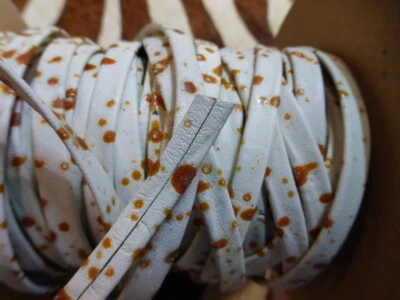 Caramel Splatter Leather Trim: 1/4" White Cowhide Lacing, 30 ft - Image 1 of 4