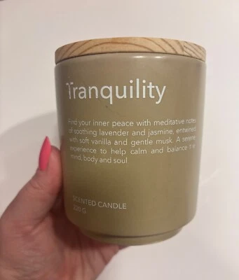 Nutmeg Home Tranquility 1 Wick Ceramic Candle Wooden Lid - Image 1 of 3