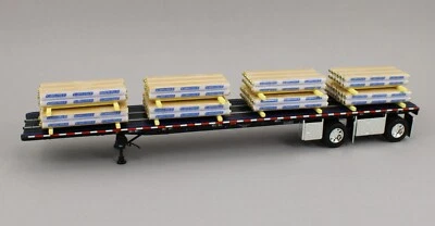 DCP 1:64 *BLACK* 53' Wilson Roadbrute Flatbed Trailer & Carlise Paper Tube Load - Image 1 of 3