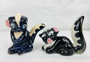 Vintage Salt & Pepper Shakers Anthropomorphic Skunks Japan Kitschy Eye Holes - Picture 1 of 9