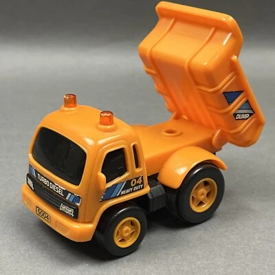 Mini camión de volteo naranja de 3” movimiento asistido E BO juguetes Foto 1 de 4