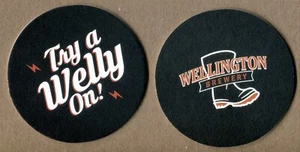 WELLINGTON BREWERY Probieren Sie einen Welly On an! GUELPH ON CANADA BIERDECKELUNTERSETZER SOUS-BOCK - Bild 1 von 3