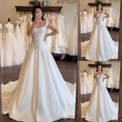 Elegantes Vestidos de Novia Sin Mangas Blanco Satinado Barrido Tren Línea A Vestidos de Baile Foto 1 de 4