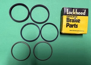 AUSTIN MORRIS 1100 1300 MK 2/3 & VARIANTS FRONT BRAKE CALIPER KIT LOCKHEED - Picture 1 of 3