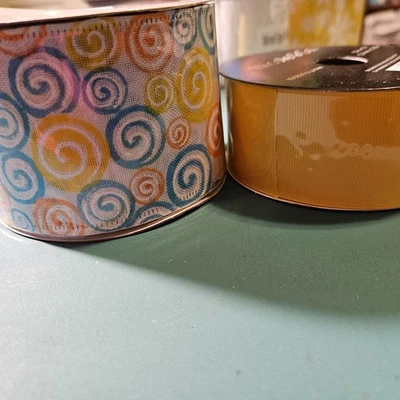 1 Roll Spring Swirl Wired Ribbon and 1 Roll Yellow Nicole & Co - Image 1 of 2