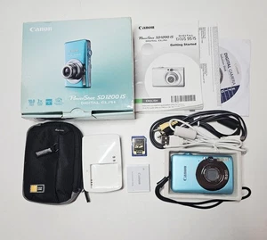 Canon PowerShot SD1200 IS ELPH 10 MP 4x zoom ottico fotocamera digitale 2 GB e custodia - Foto 1 di 20