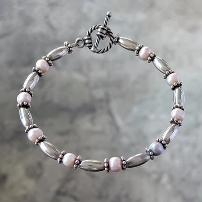 Pulsera de plata de ley de perlas rosadas cuentas de barril cierre de palanca retorcido 7,5" 10 g Foto 1 de 4