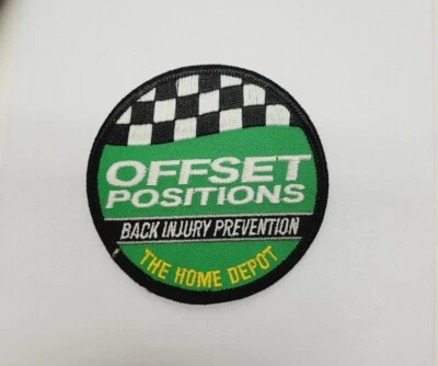 Parche verde de posiciones compensadas para prevención de lesiones en la espalda de empleados de The Home Depot - NE Foto 1 de 3