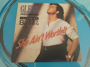 Glenn Medeiros & Bobby Brown She Ain't Worth It 7" Vinyl - Picture 1 of 3