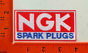 NGK Spark Plugs Patch – Embroidered Iron-On Sew-On Automotive Racing Logo Badge - Picture 1 of 1