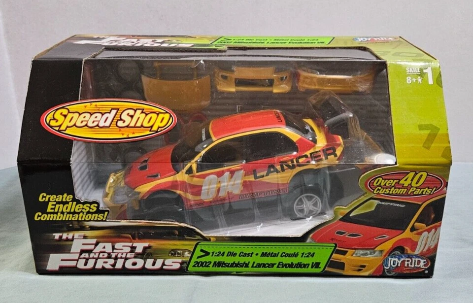 *RARE* FAST & FURIOUS JOYRIDE 1:24 Die-cast 2004 Mitsubishi Red Lancer Evo VII - Image 1 of 4